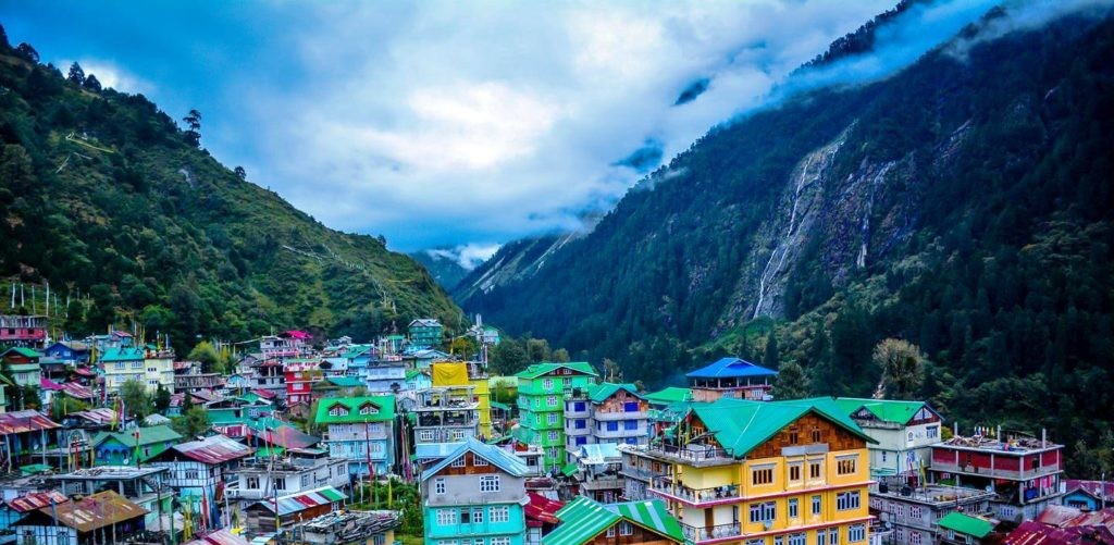 Darjeeling sightseeing view with hills, clouds and greenary all around